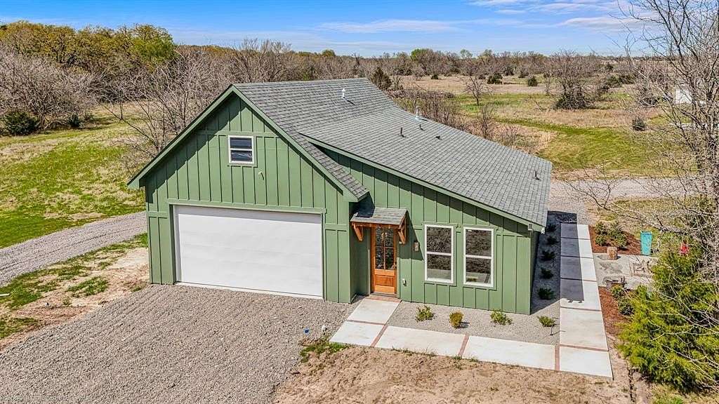 5 Acres of Land with Home for Sale in Wolfe City, Texas