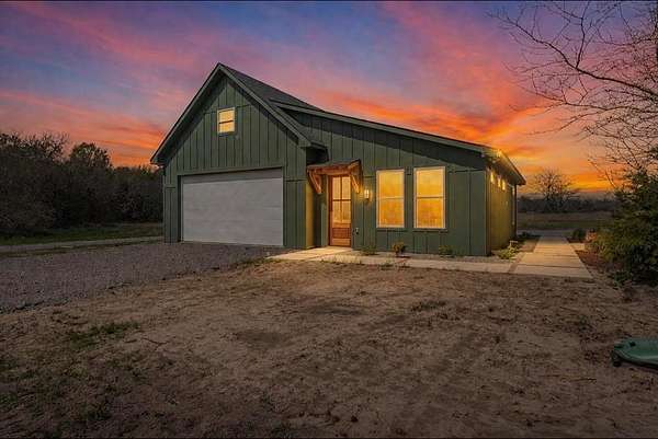 5 Acres of Land with Home for Sale in Wolfe City, Texas