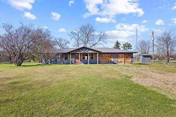 10 Acres of Land with Home for Sale in Ravenna, Texas