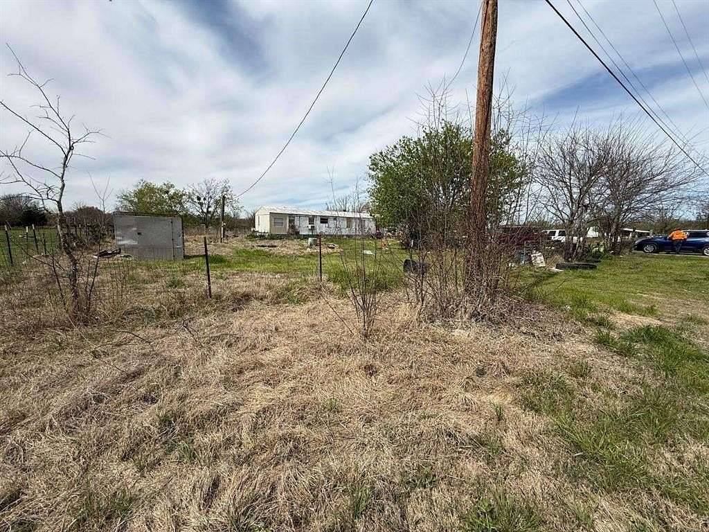 1.5 Acres of Land with Home for Sale in Quinlan, Texas