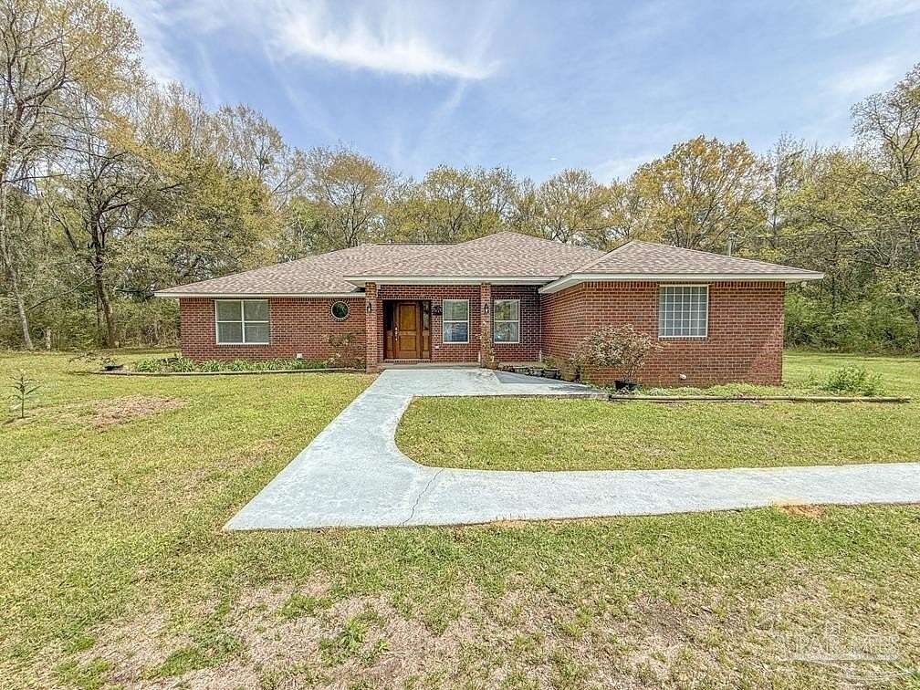 2.2 Acres of Land with Home for Sale in Pace, Florida