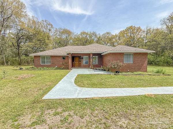 2.2 Acres of Land with Home for Sale in Pace, Florida