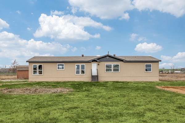 1.5 Acres of Land with Home for Sale in Collinsville, Texas