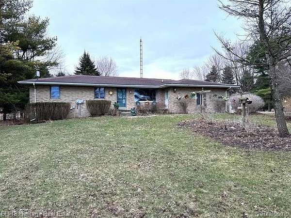 1.5 Acres of Land with Home for Sale in Fowlerville, Michigan