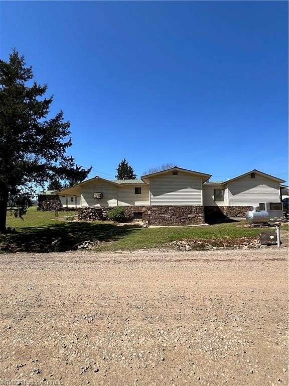 5.36 Acres of Land with Home for Sale in Subiaco, Arkansas