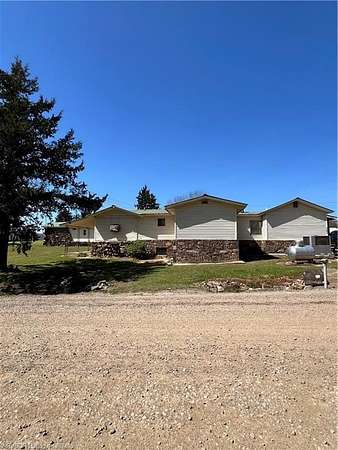 5.36 Acres of Land with Home for Sale in Subiaco, Arkansas