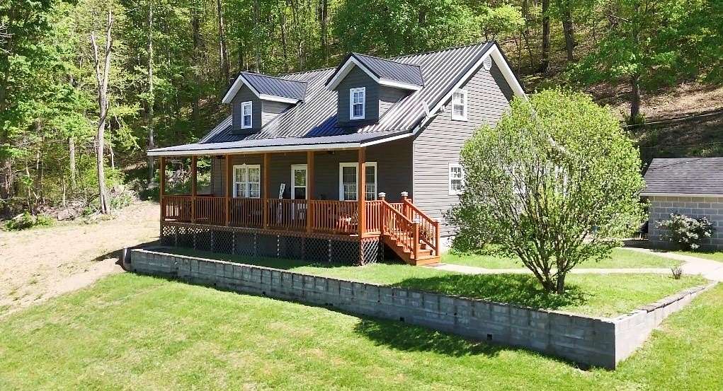 3.6 Acres of Land with Home for Sale in Louisa, Kentucky