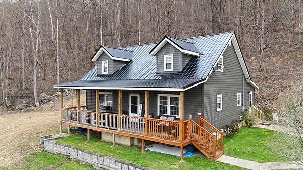 3.6 Acres of Land with Home for Sale in Louisa, Kentucky