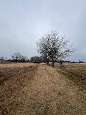 27.1 Acres of Agricultural Land with Home for Sale in Denison, Texas
