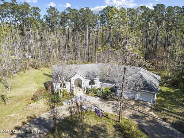 5.57 Acres of Land with Home for Sale in Brandon, Mississippi