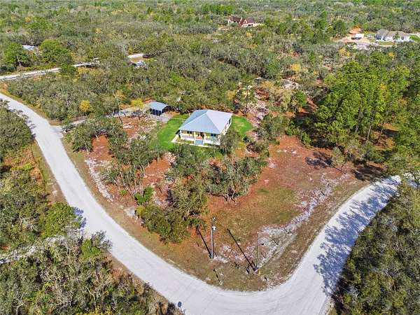 2.86 Acres of Land with Home for Sale in Frostproof, Florida
