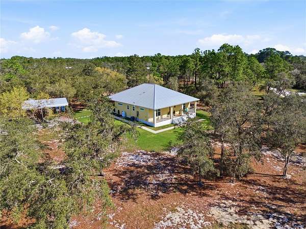2.86 Acres of Land with Home for Sale in Frostproof, Florida
