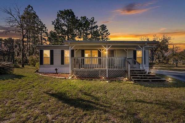 1.56 Acres of Land with Home for Sale in Williston, Florida