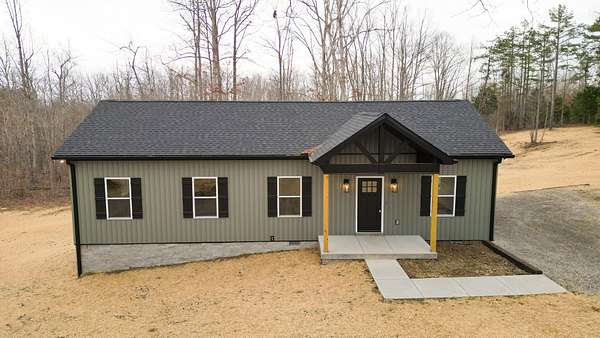 1.79 Acres of Land with Home for Sale in Nunnelly, Tennessee