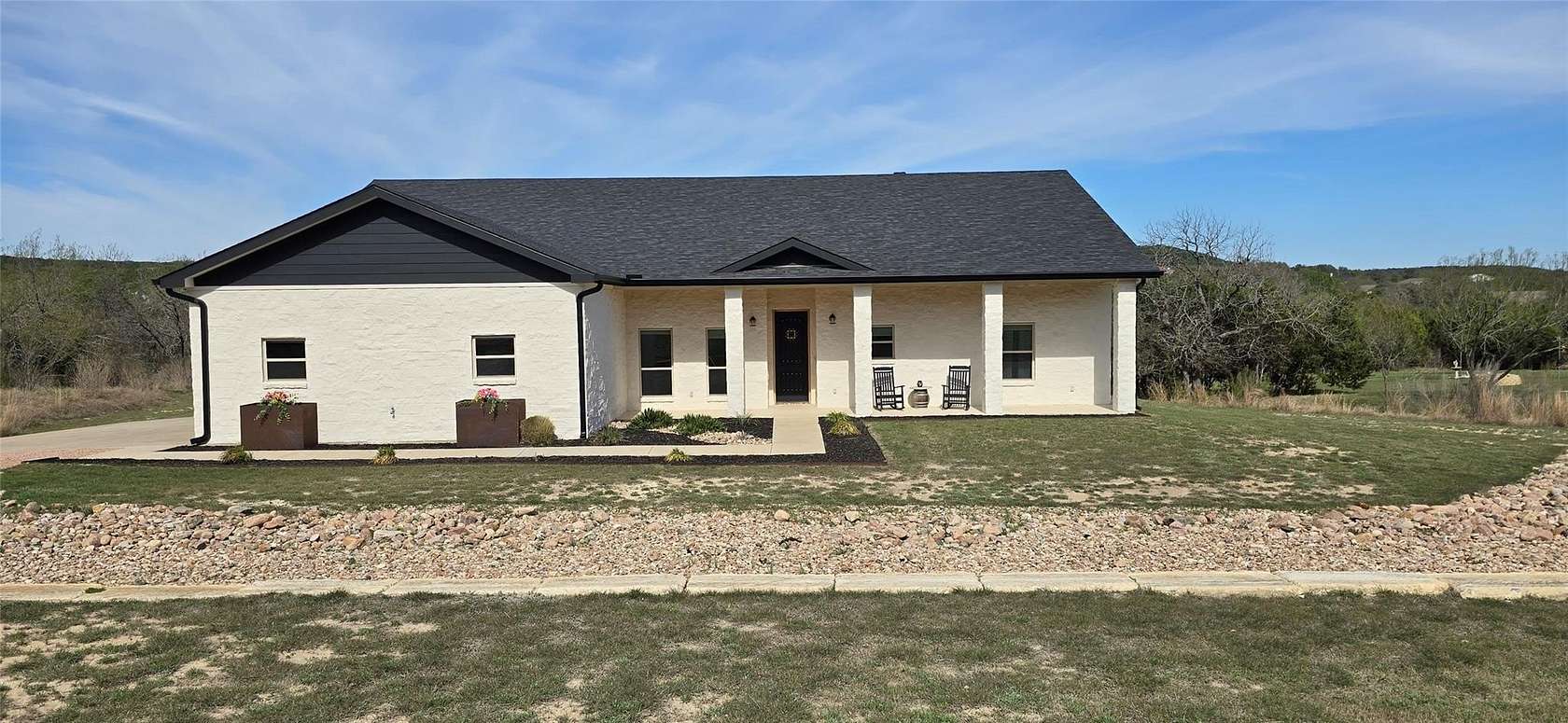 1.55 Acres of Land with Home for Sale in Bertram, Texas