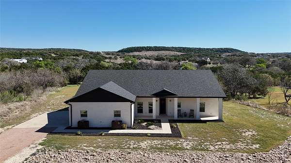 1.55 Acres of Land with Home for Sale in Bertram, Texas