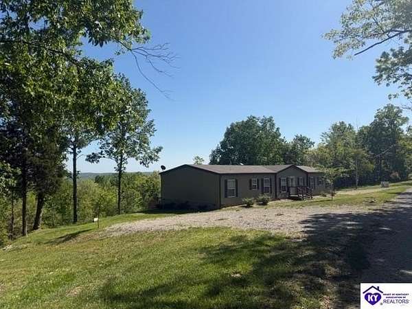 21.1 Acres of Land with Home for Sale in Falls of Rough, Kentucky