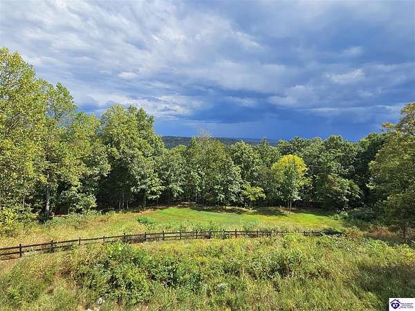 21.1 Acres of Land with Home for Sale in Falls of Rough, Kentucky