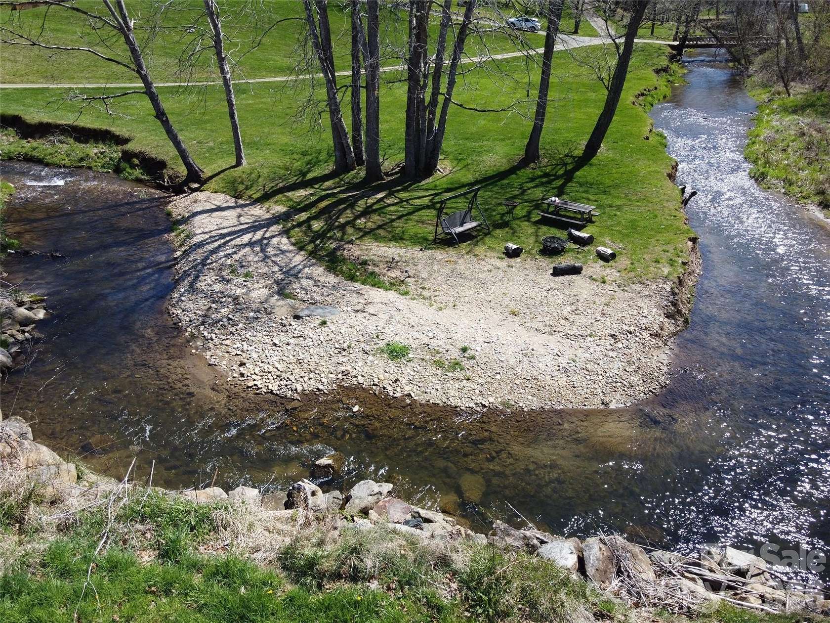 12.4 Acres of Land with Home for Sale in Burnsville, North Carolina