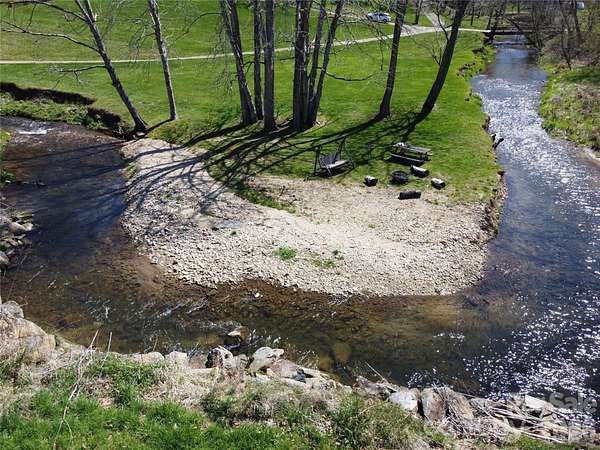 12.4 Acres of Land with Home for Sale in Burnsville, North Carolina