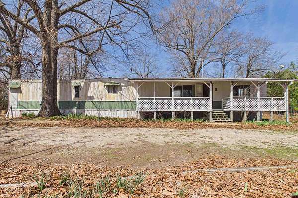 4.48 Acres of Land with Home for Sale in Valley Springs, Arkansas