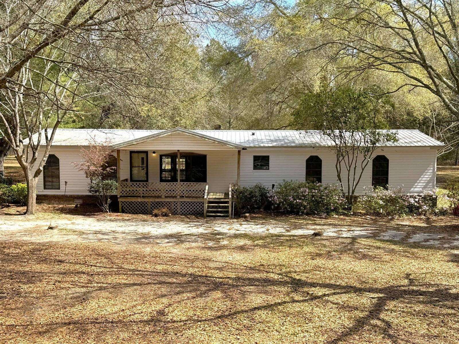 14.3 Acres of Land with Home for Auction in Metter, Georgia