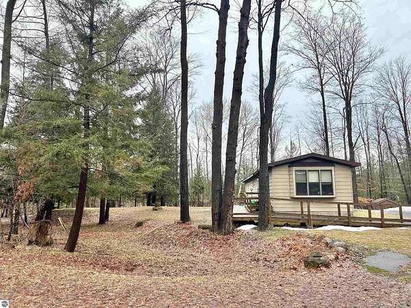 1.83 Acres of Land with Home for Sale in Williamsburg, Michigan