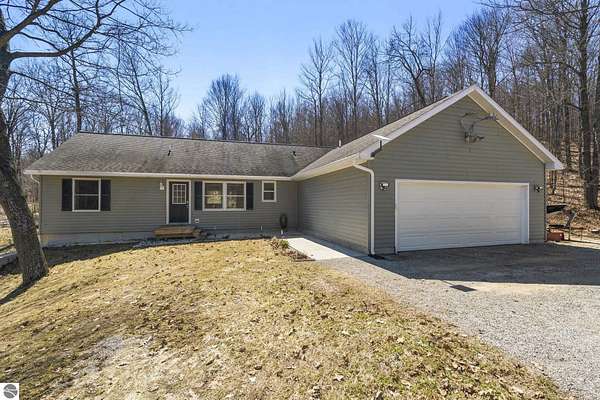 10 Acres of Land with Home for Sale in Thompsonville, Michigan