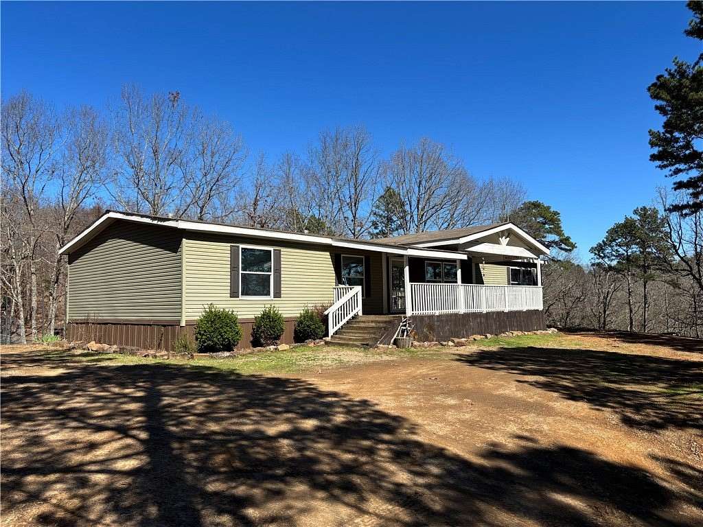 9.39 Acres of Land with Home for Sale in Russellville, Arkansas