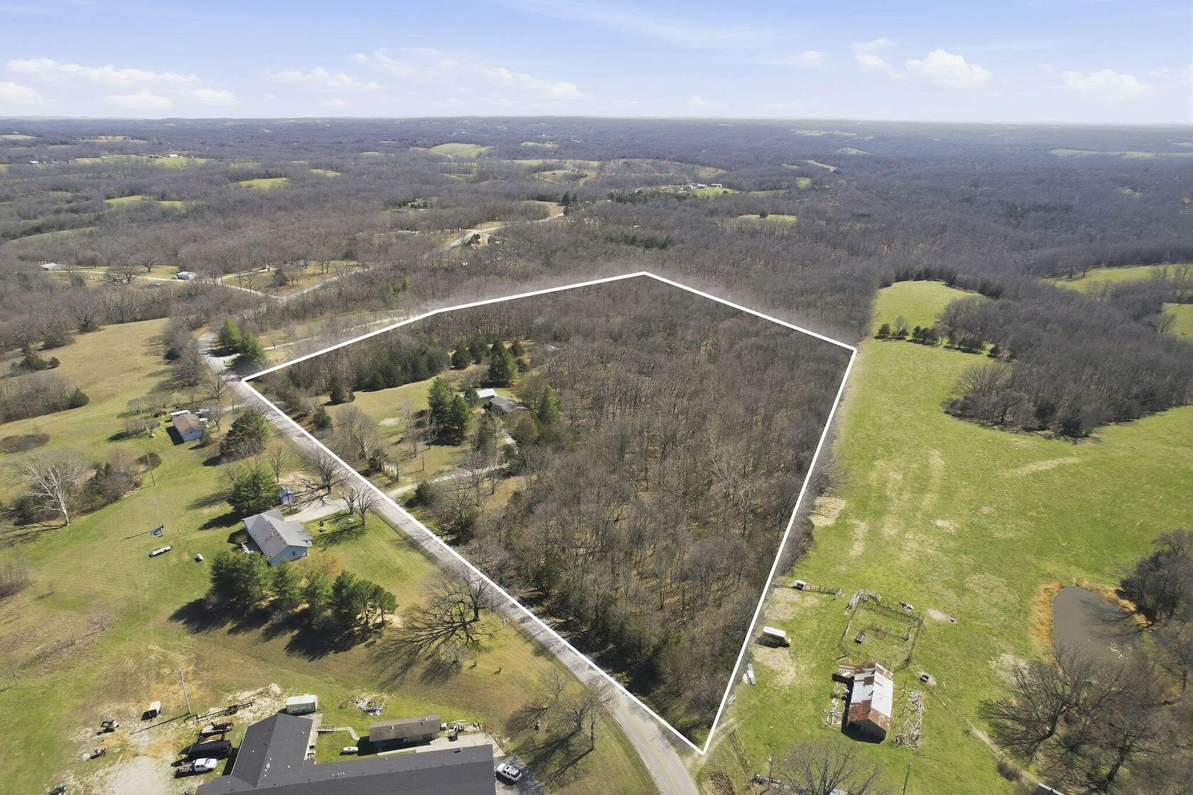 11.6 Acres of Land with Home for Sale in Galena, Missouri