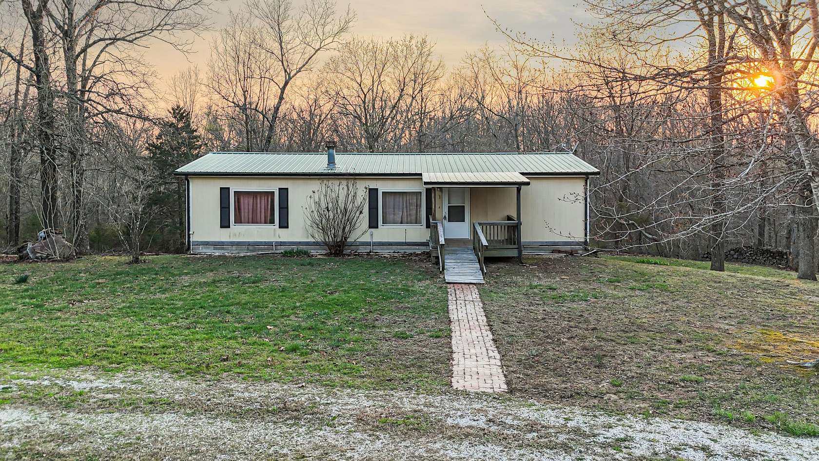 14.5 Acres of Land with Home for Sale in Stella, Missouri