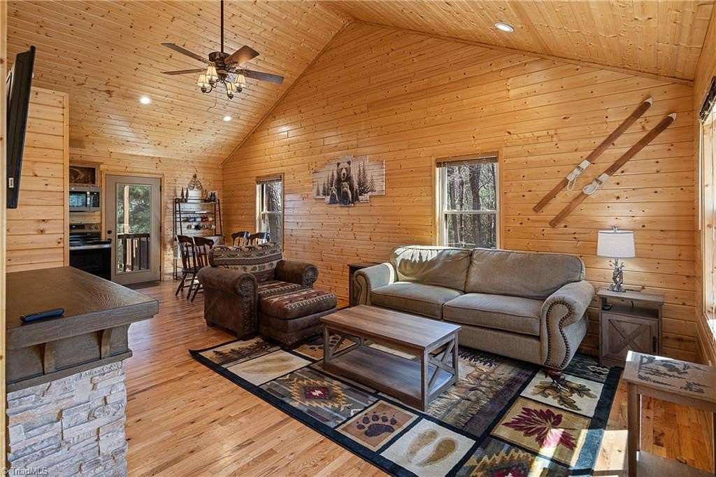5.49 Acres of Land with Home for Sale in Purlear, North Carolina