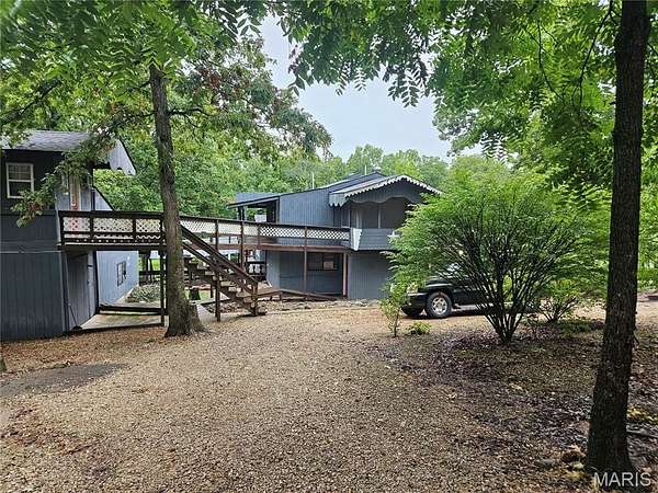 9.8 Acres of Land with Home for Sale in Belle, Missouri