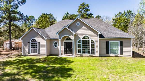 15.8 Acres of Land with Home for Sale in Big Sandy, Texas