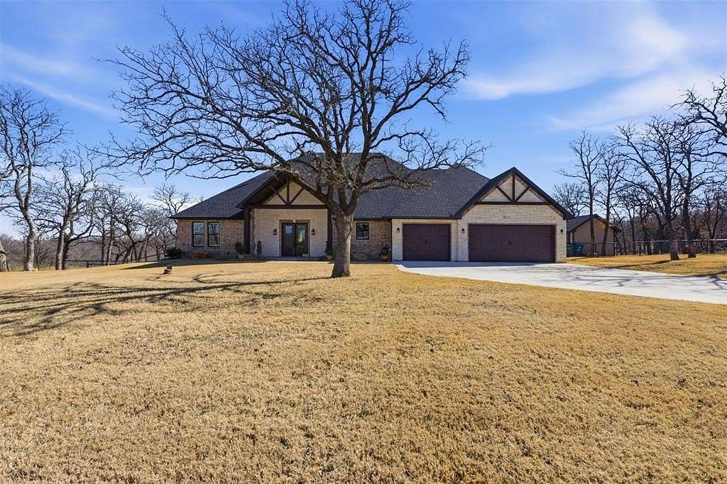 2.54 Acres of Land with Home for Sale in Runaway Bay, Texas