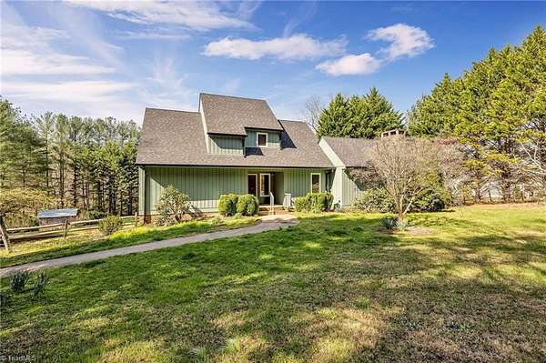 3.17 Acres of Land with Home for Sale in Millers Creek, North Carolina