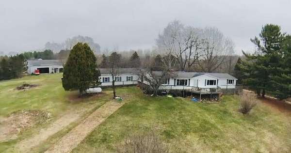 9.6 Acres of Land with Home for Sale in Charlotte, Michigan