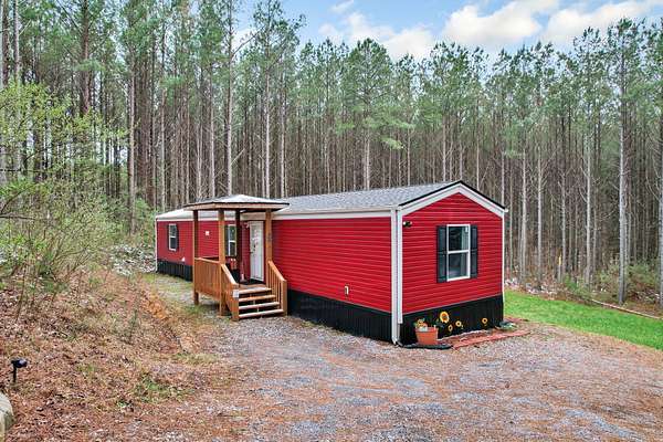 3 Acres of Land with Home for Sale in Graysville, Tennessee