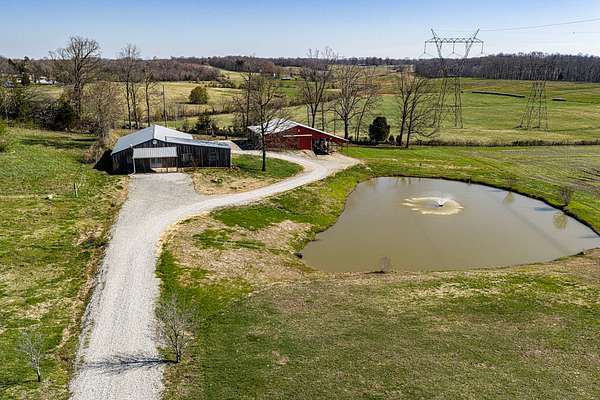 11.9 Acres of Land with Home for Sale in Belton, Kentucky