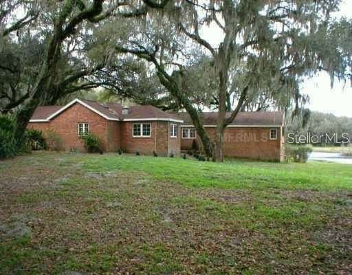 2.4 Acres of Land with Home for Sale in Zephyrhills, Florida