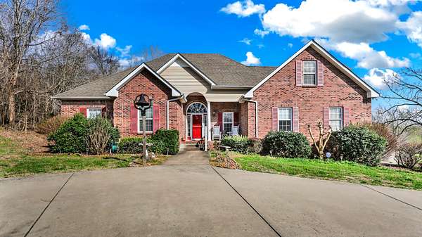 6.13 Acres of Land with Home for Sale in Woodlawn, Tennessee