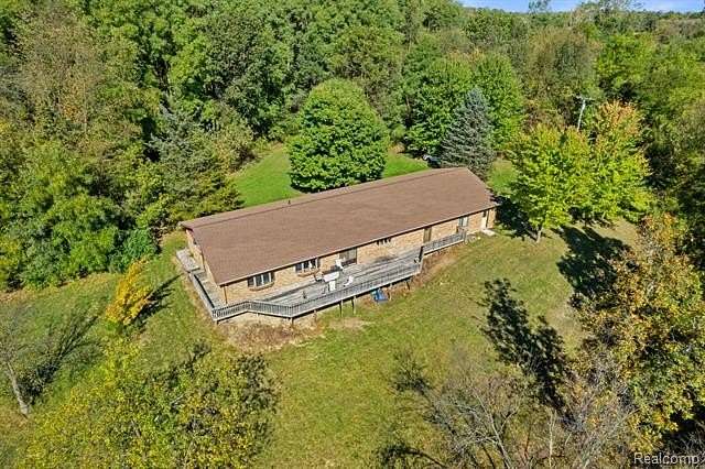11 Acres of Recreational Land with Home for Sale in Woodstock Township, Michigan