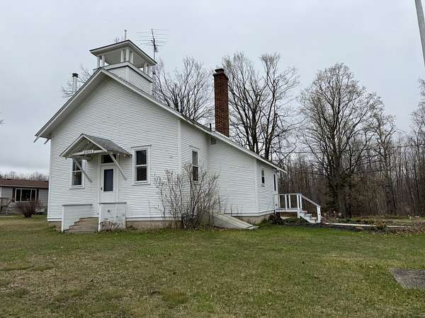 79 Acres of Recreational Land with Home for Sale in Hillman, Michigan