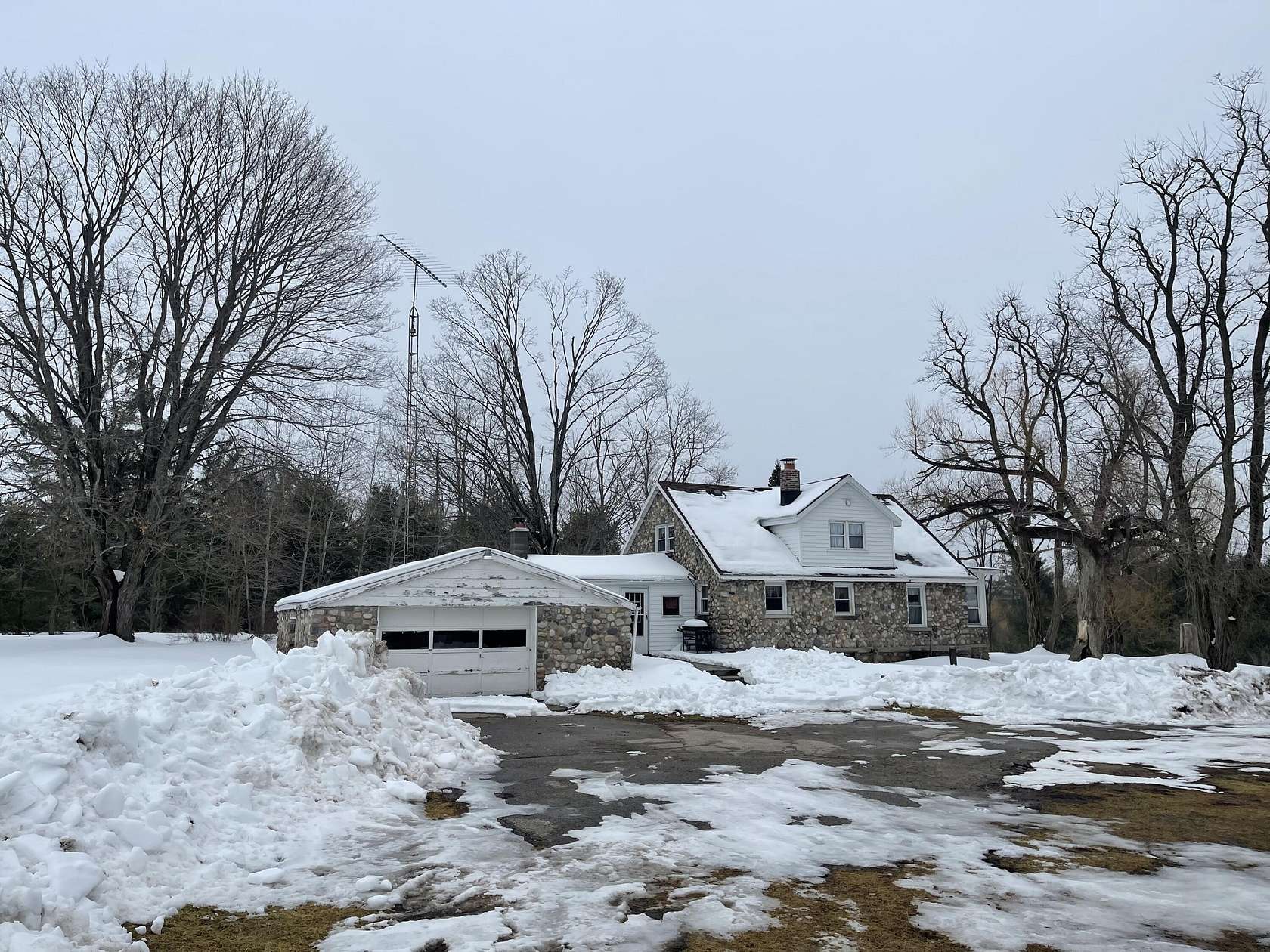 5 Acres of Land with Home for Sale in Alpena, Michigan