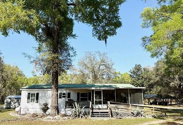 5 Acres of Land with Home for Sale in Chiefland, Florida