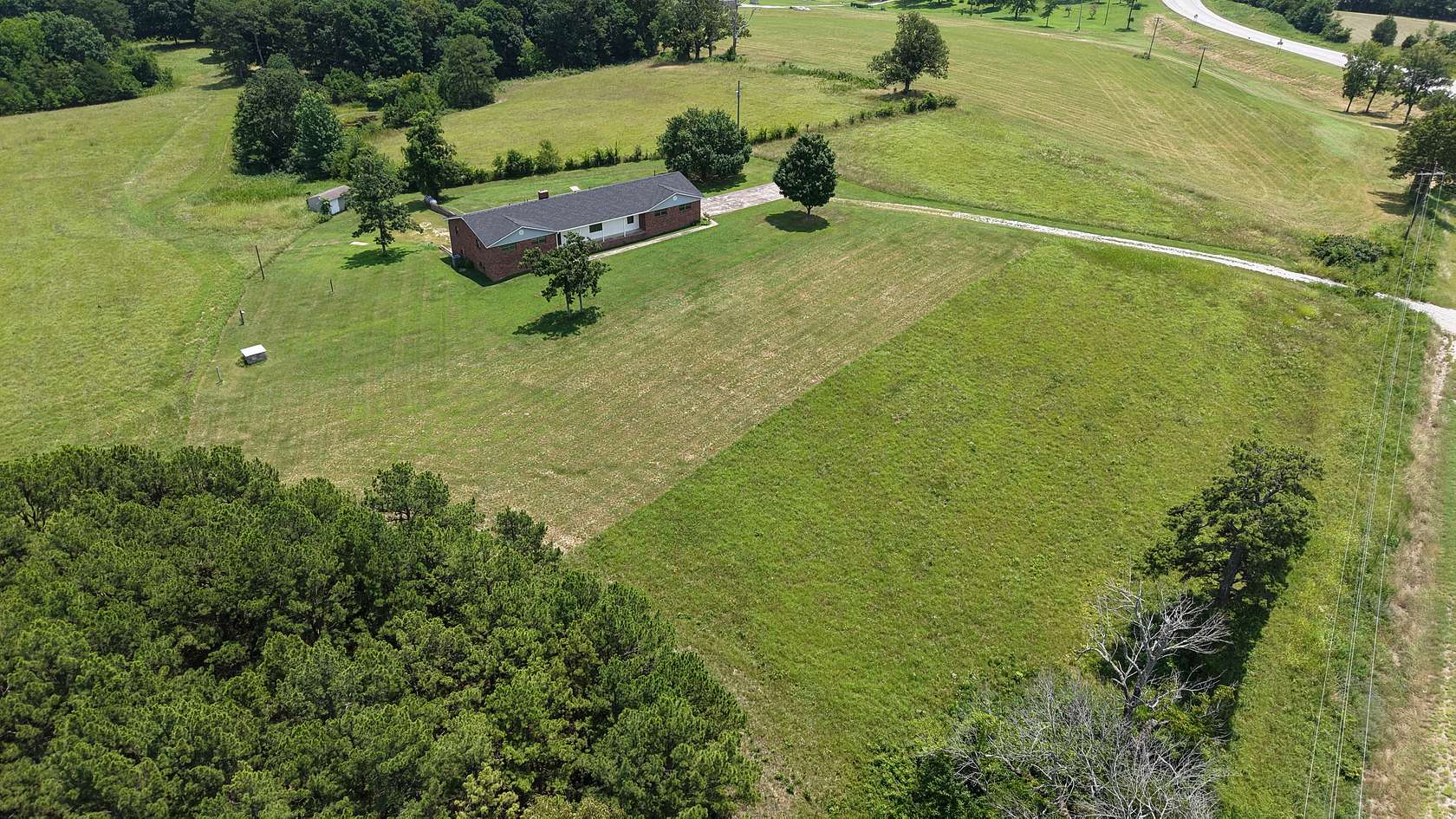 8.2 Acres of Land with Home for Sale in Melbourne, Arkansas