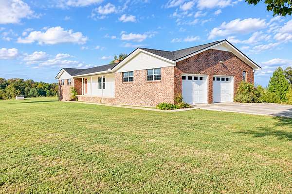 5 Acres of Land with Home for Sale in Melbourne, Arkansas