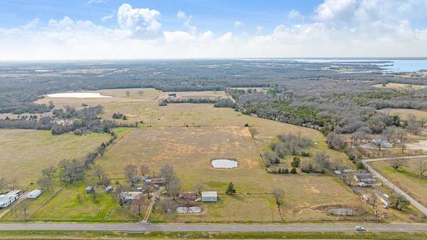 14.5 Acres of Land with Home for Sale in Honey Grove, Texas