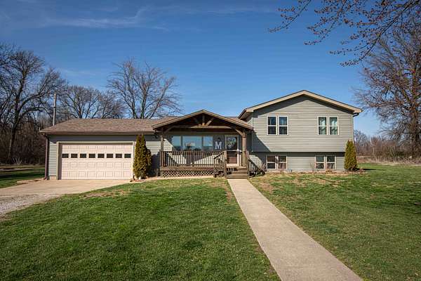 12 Acres of Recreational Land with Home for Sale in Lamar, Missouri