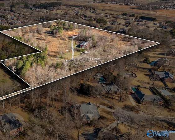 21.3 Acres of Land with Home for Sale in Harvest, Alabama